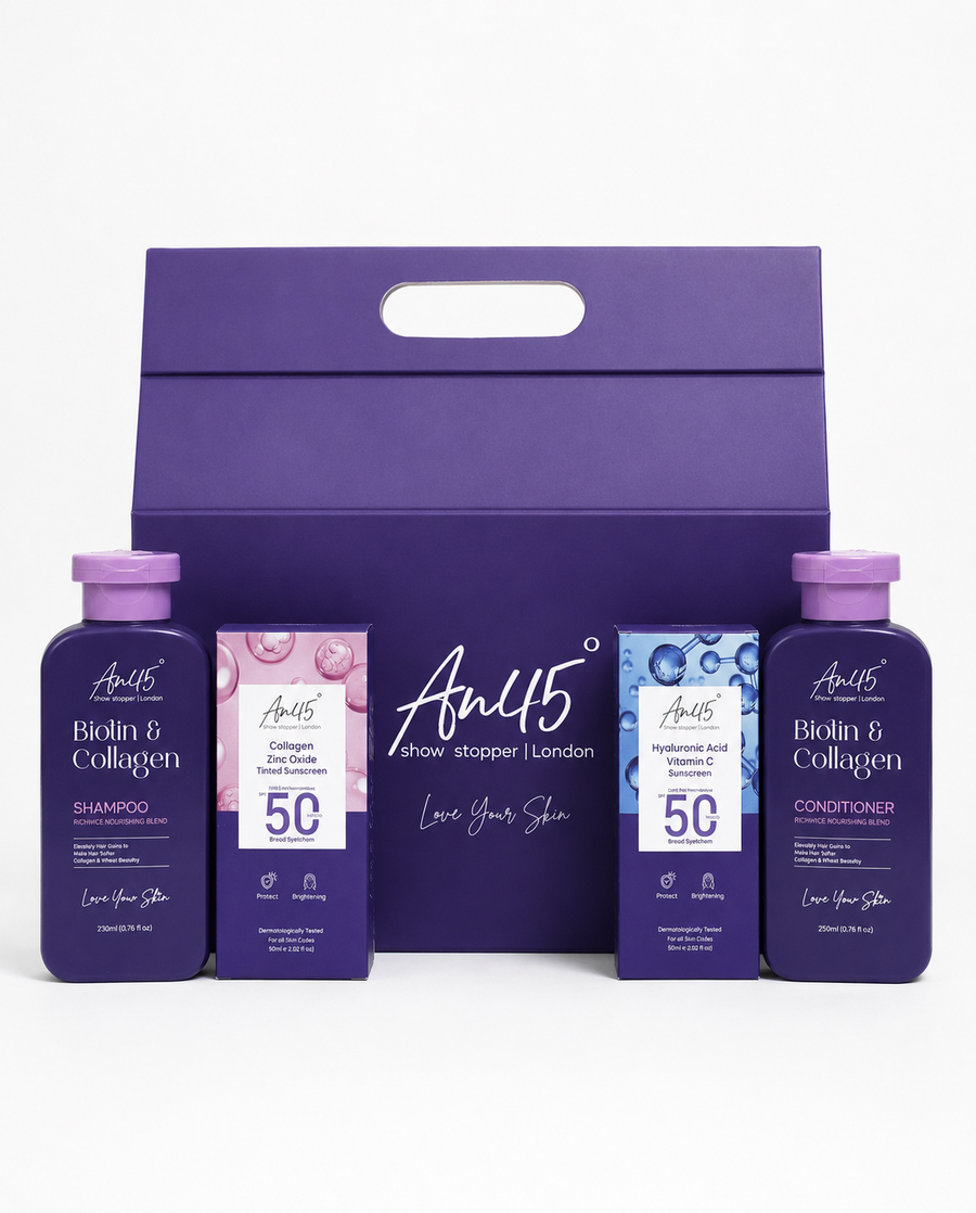 AN45° purple gift box with the four hamper products in front — shampoo, tinted sunscreen, sunscreen fluid, conditioner