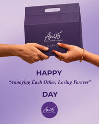 A brother and sister passing the AN45° gift box between them — Happy “annoying each other, loving forever” day