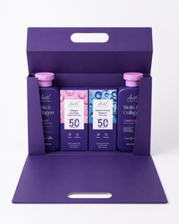 AN45° Rakhi Gift Hamper — the purple keepsake box opened, with the Biotin & Collagen Shampoo, SPF 50 Tinted Sunscreen, SPF 50 Sunscreen Fluid and Biotin & Collagen Conditioner inside